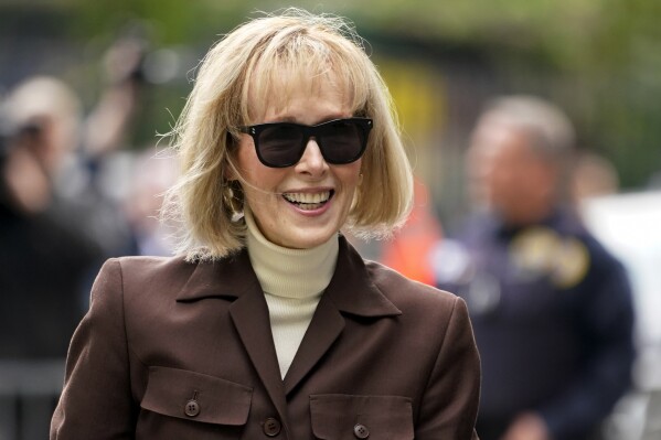 FILE — E. Jean Carroll arrives at Manhattan federal court, Tuesday, May 9, 2023, in New York. A federal judge tossed out former President Donald Trump's countersuit against Carroll who won a sex abuse lawsuit against him, ruling Monday, Aug. 7, 2023, that Trump can't claim she defamed him by continuing to say she was not only sexually abused but raped. (AP Photo/John Minchillo, File)